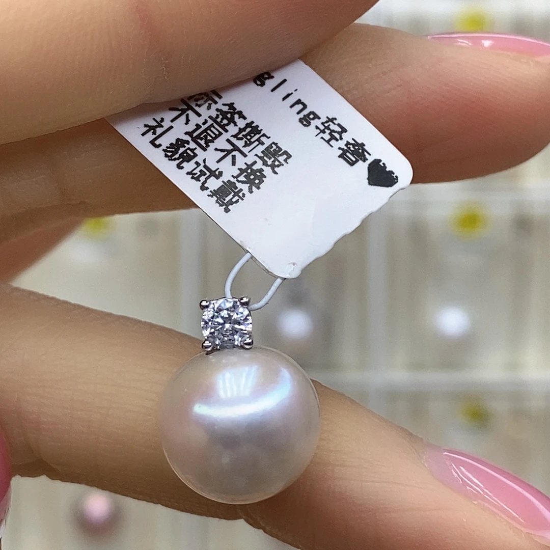禾****淡水珍珠银S925镶嵌吊坠(赠链)