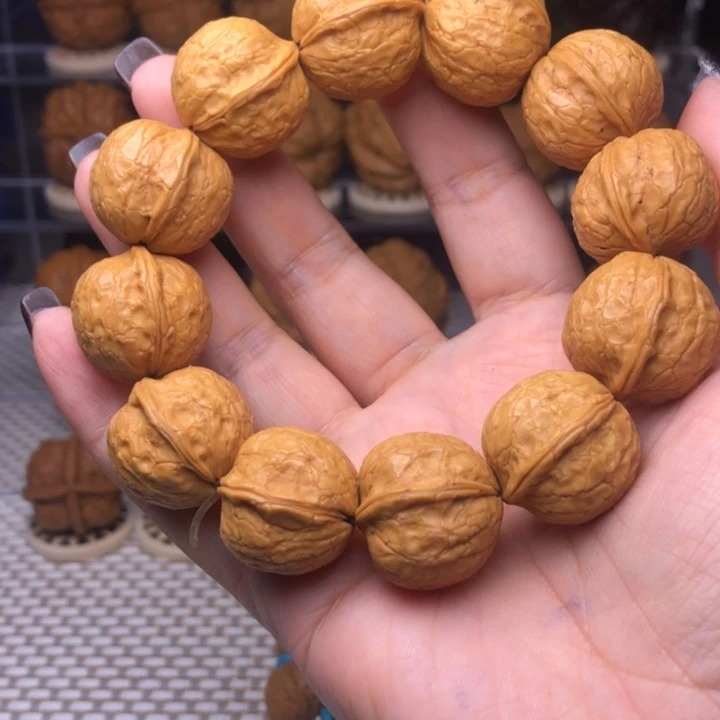 张***嘟文玩核桃把件16号黄金豆手串