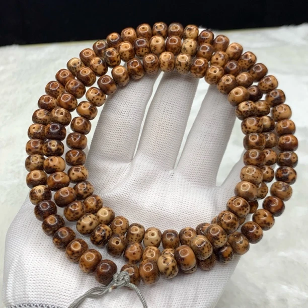 精品陈籽莽缠腰9×7mm老型桶长串，莽皮纹，高油高密