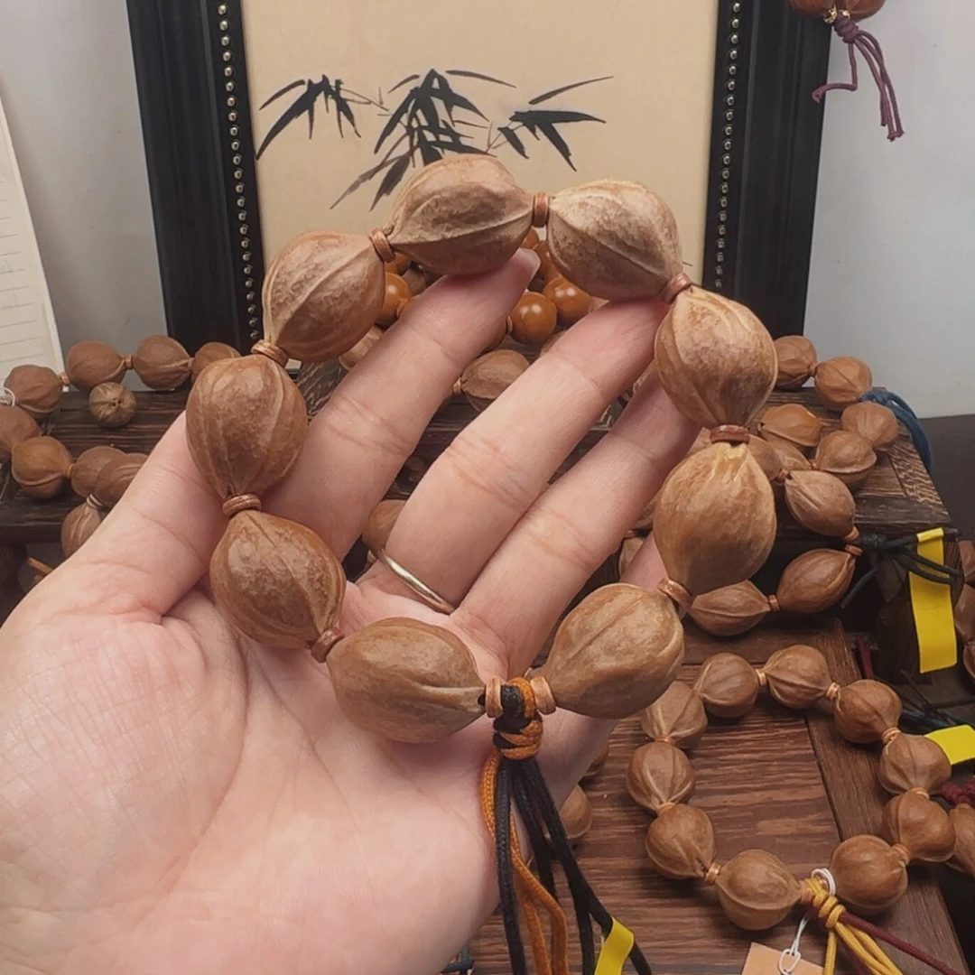 河***人手串橄榄核21.27梅林铁核