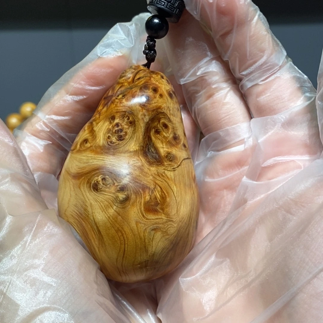 柏木（崖柏）陈化瘤火焰纹手把件