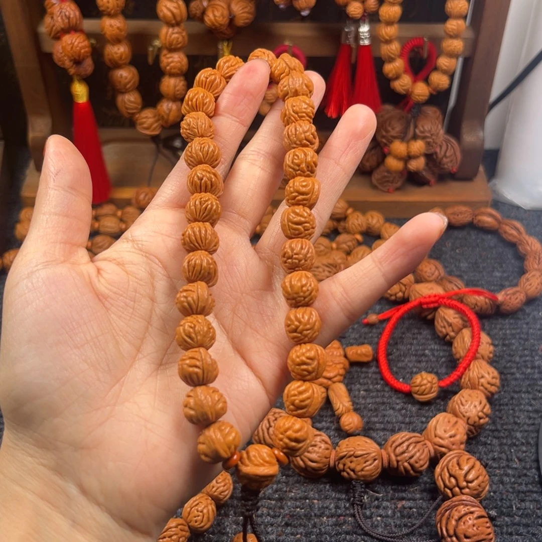 吊坠桃核桃枭手持L3