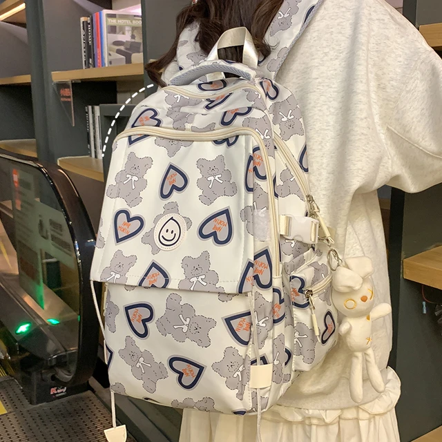 高颜值书包女生初中生韩版高中大容量双肩包大学生设计感轻便背包