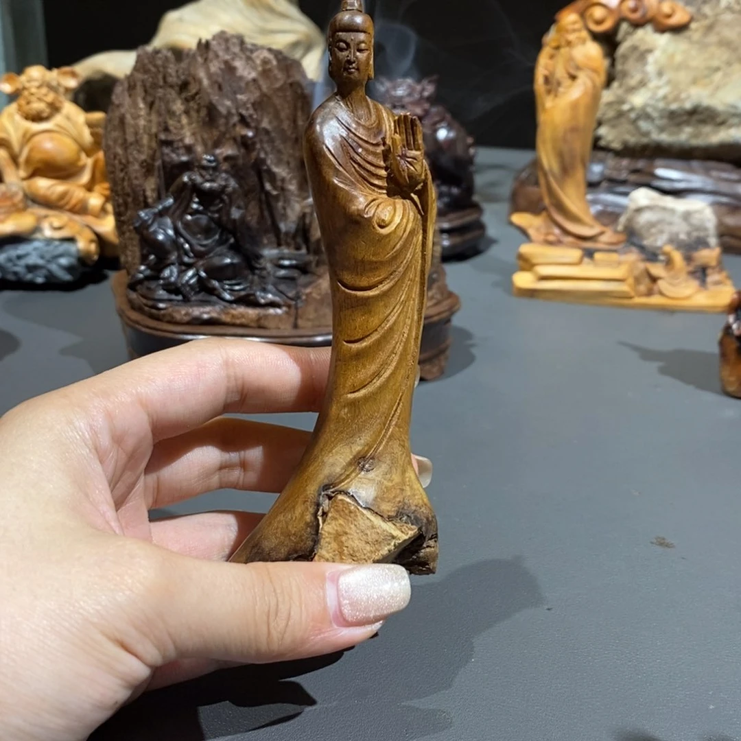 木如****7金丝楠北魏佛摆件根抱石