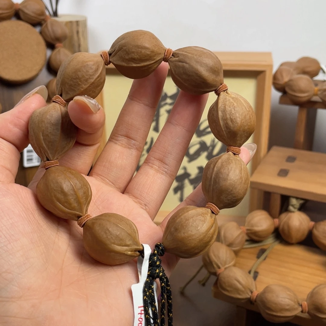 用***颂手串/手链橄榄核22*28梅林铁核