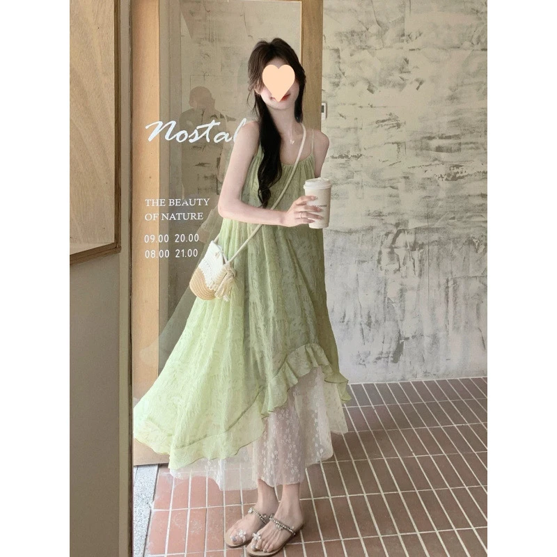 法式2025印花夏季拼接新款海边吊带度假气质不规则连衣裙裙子显瘦