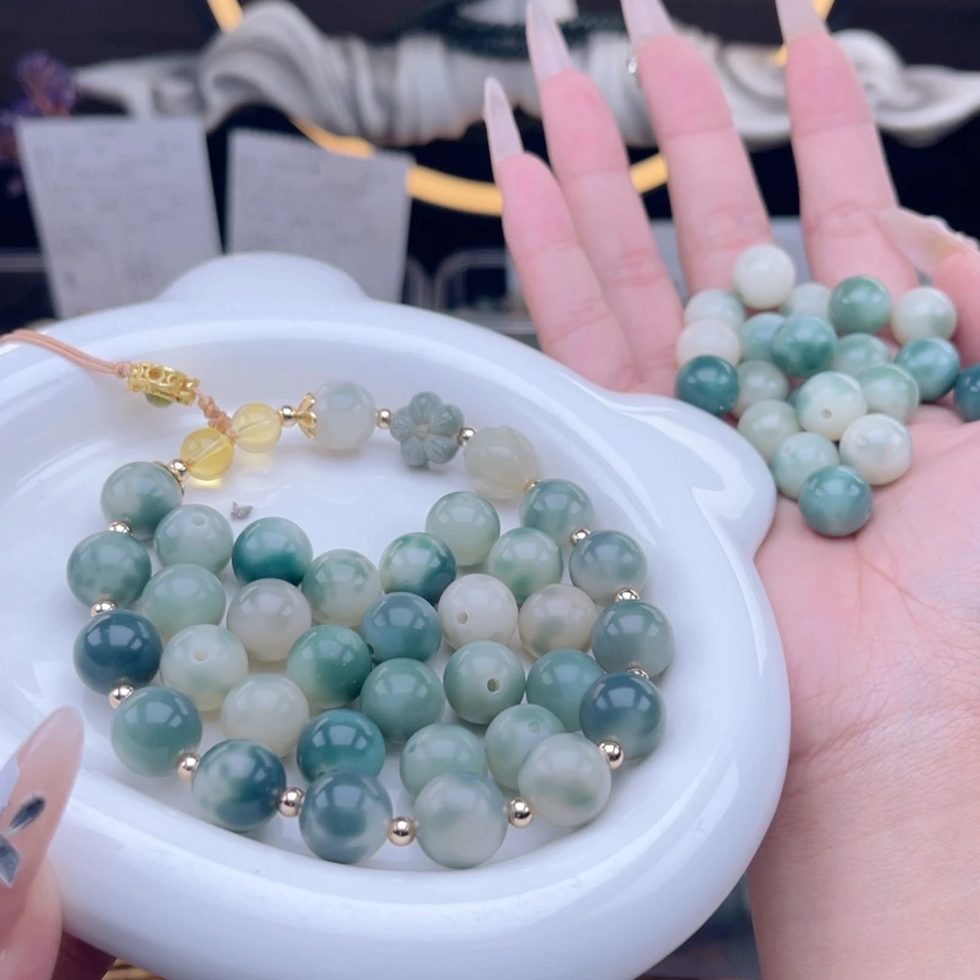 白玉菩提吊坠q12mm110颗。马尔代夫绿花皮