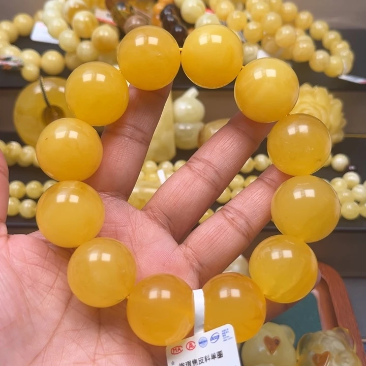 琥珀未镶嵌珠宝奇石M115号23+鸡油黄微瑕