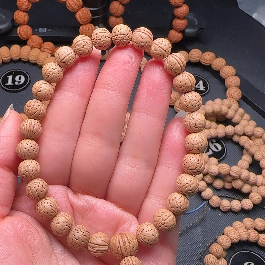 浪***鱼手串文玩核桃滴溜圆桃核手持
