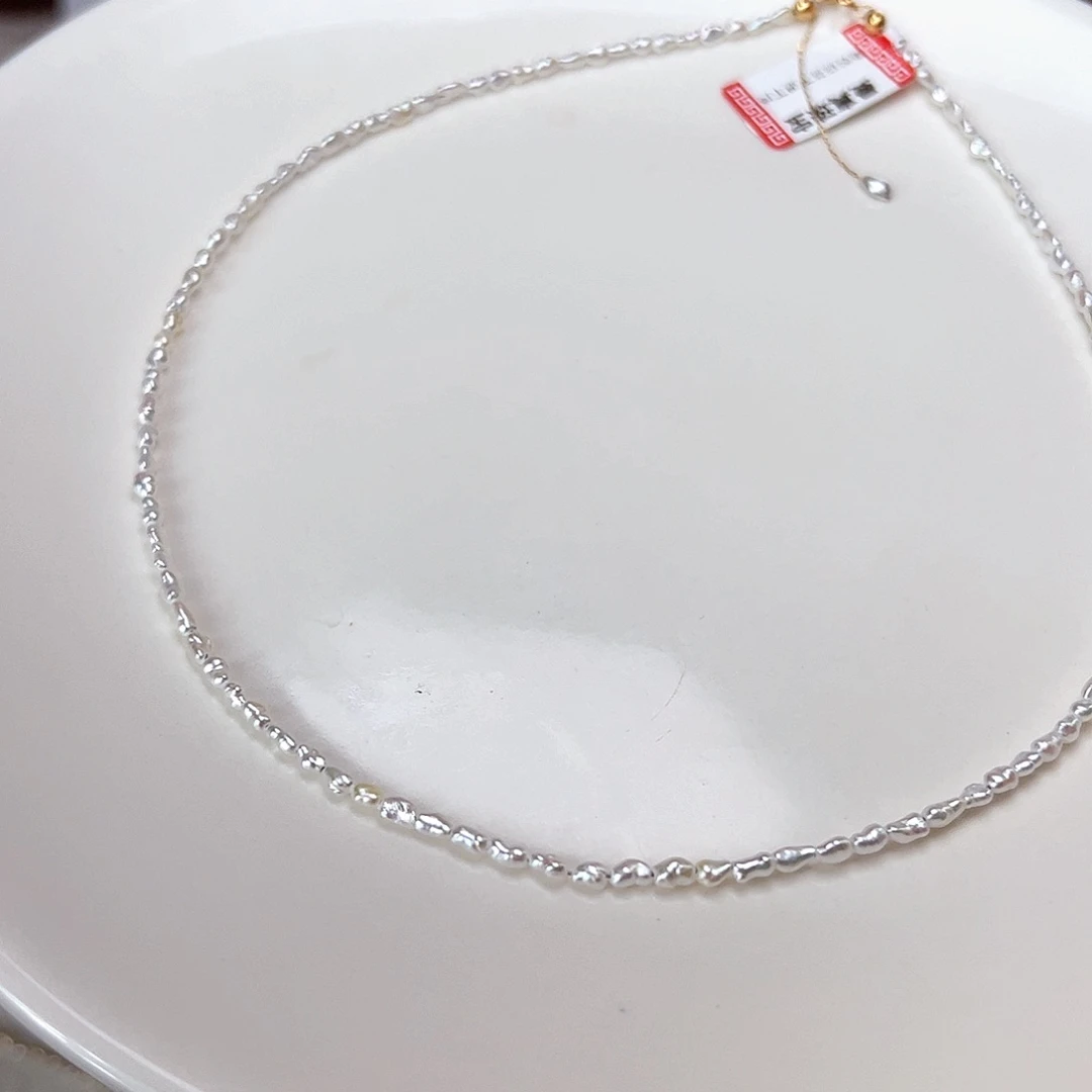 海水珍珠18K金镶嵌颈饰跌***里