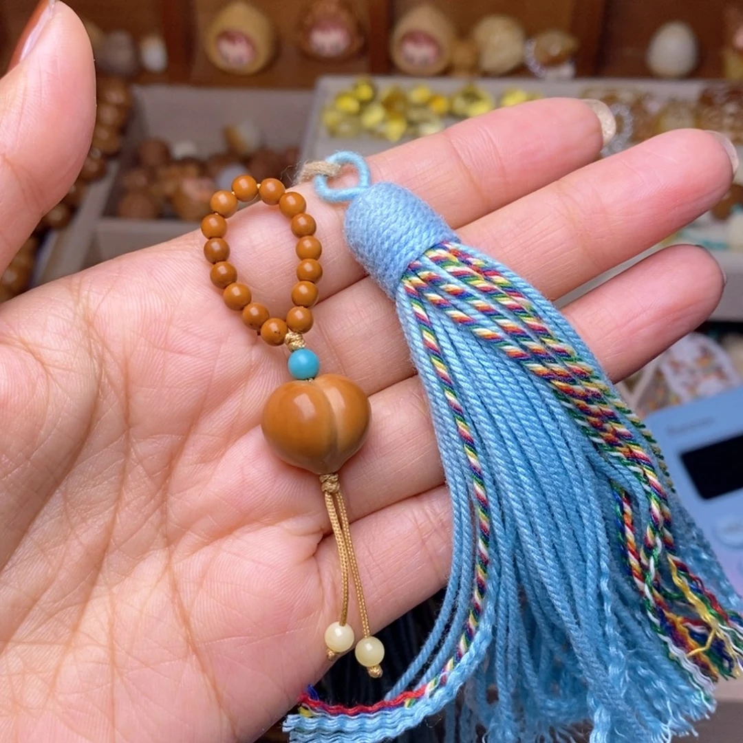 猴头核桃手串屁桃大提溜蓝色流苏
