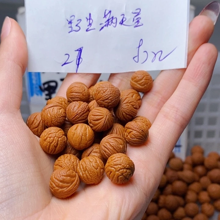 一***。桃核手串12mm左右野生满天星27颗（打孔）