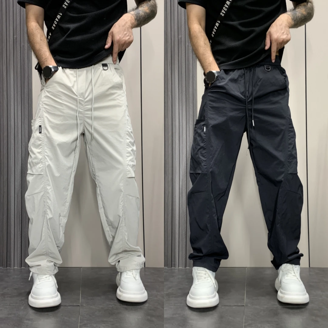 2025夏季薄款男士宽松工装拼接直筒裤潮流网眼透气纯色弯刀休闲裤