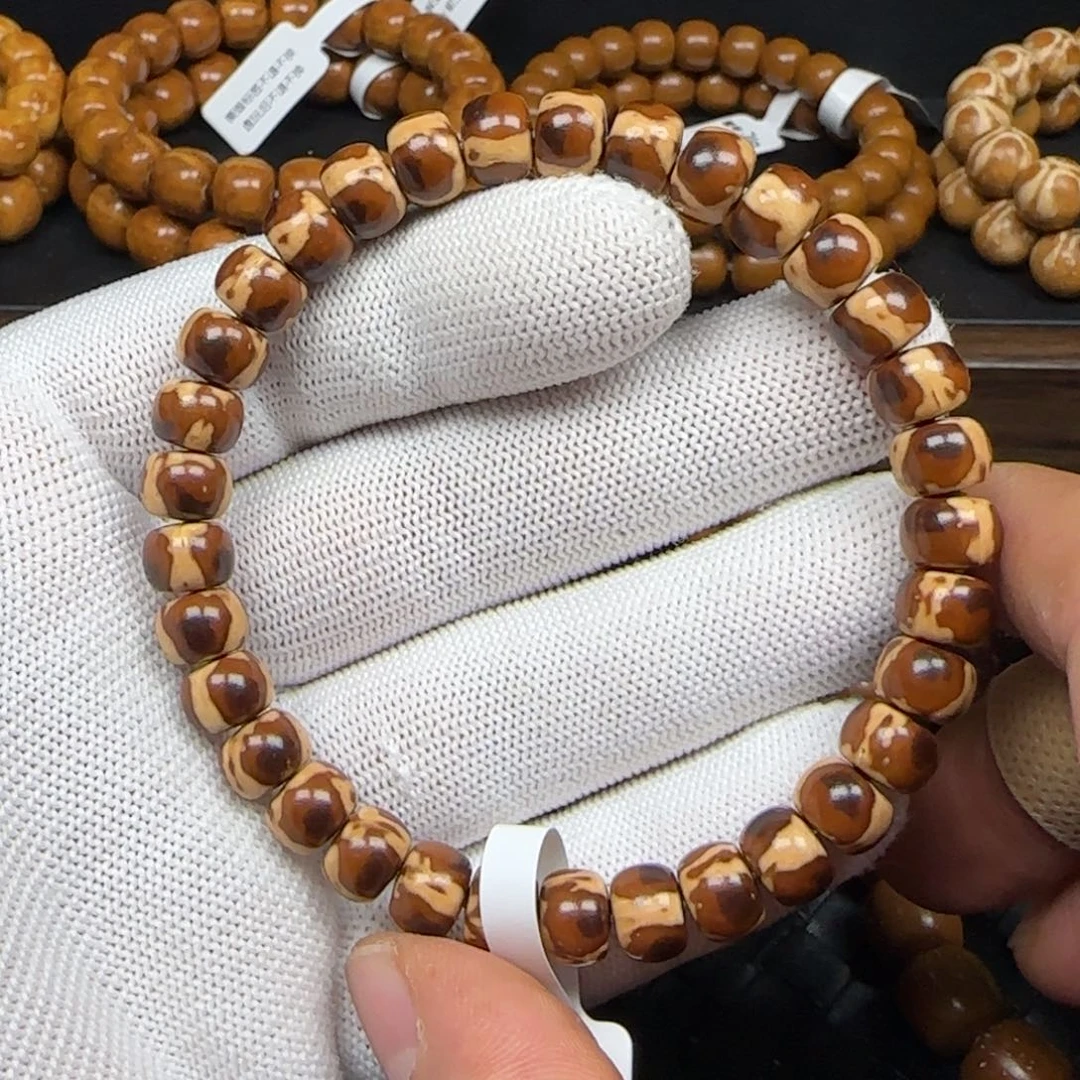 汀***笑紫金鼠手串8.6mm纯肉三花老型264