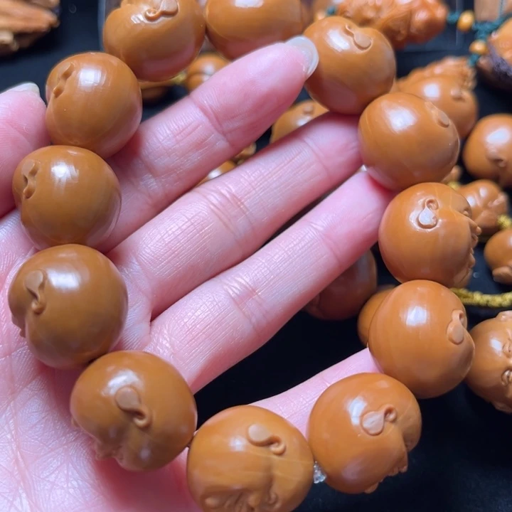 我***…吊坠橄榄核开心串