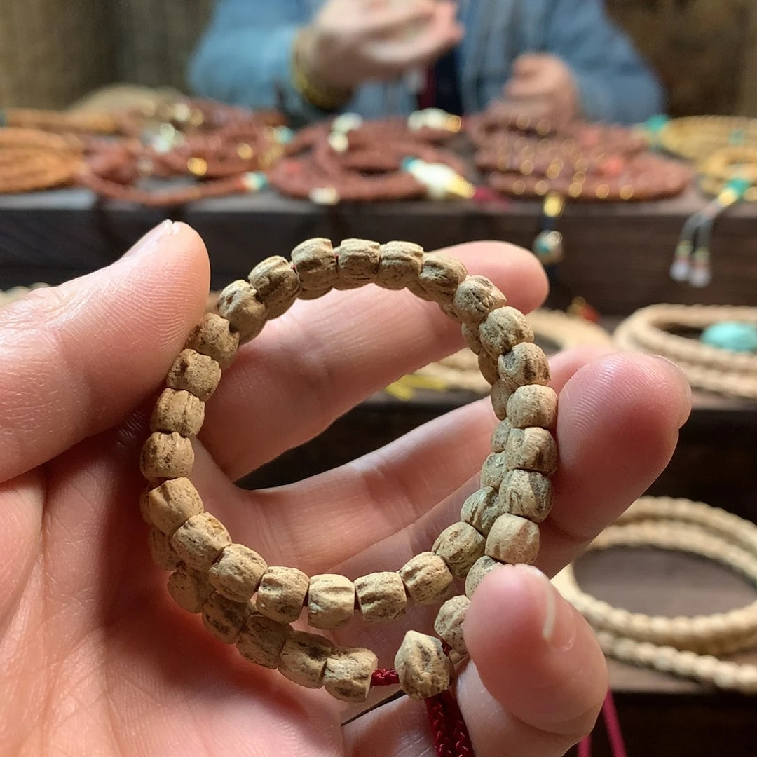 柏香籽/百香籽吊坠呆****.手持