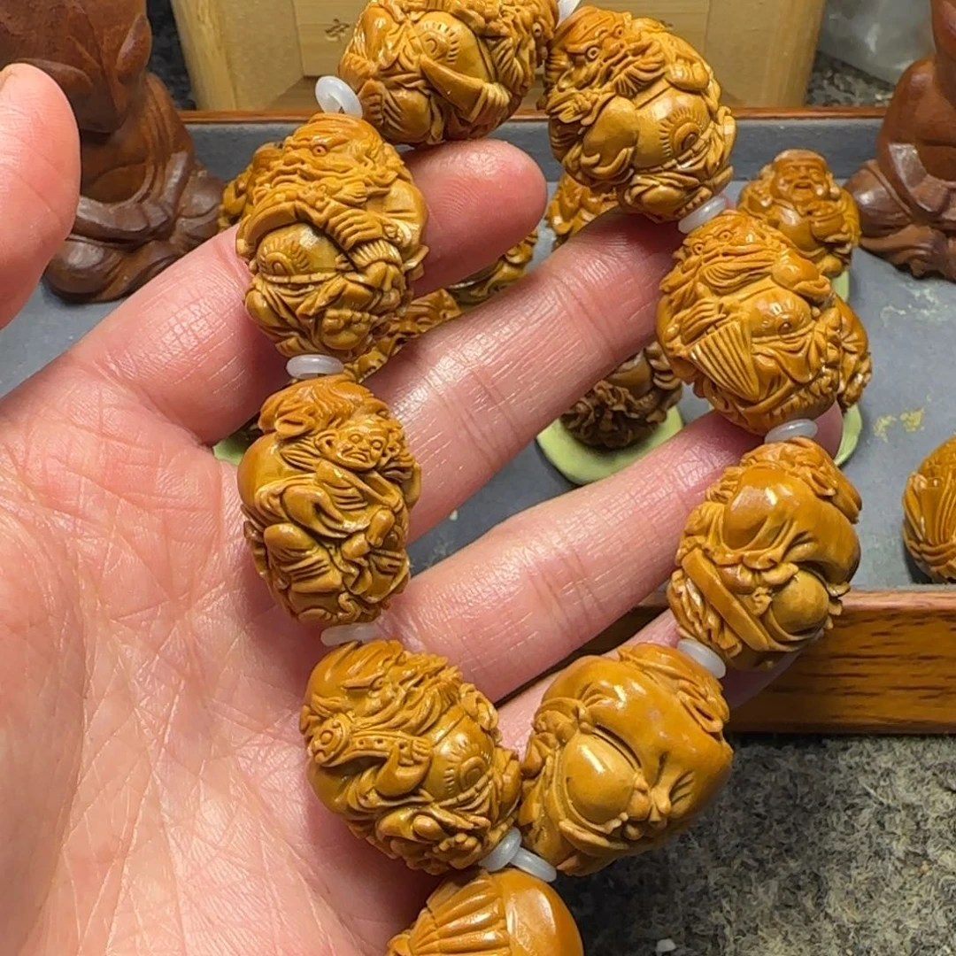 橄榄核吊坠你**迪……………………