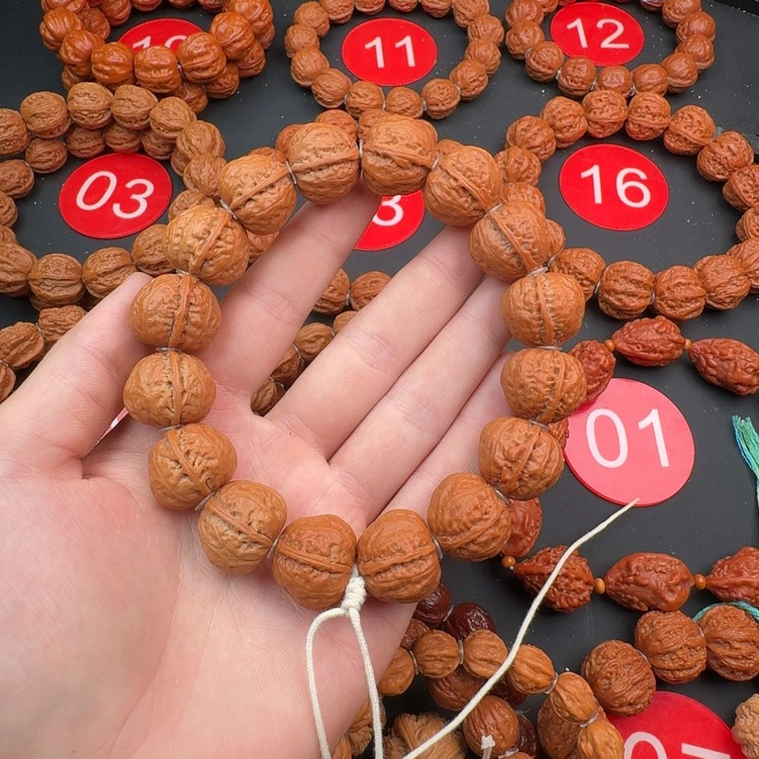 可***鸭文玩核桃吊坠元宝