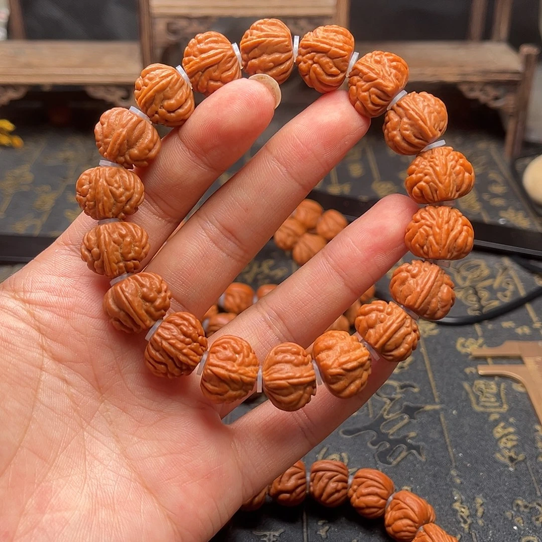 吊坠桃核红魔三角龙