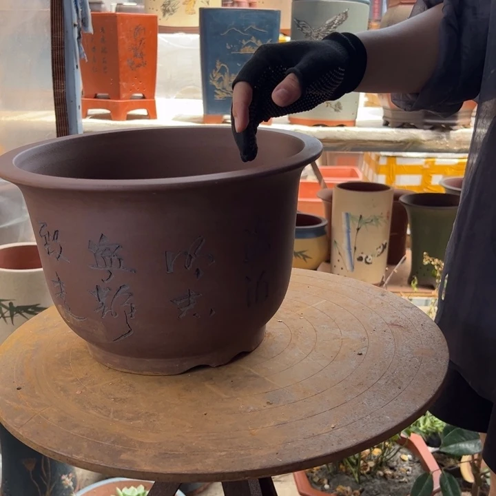 宜兴紫砂30平角金钟