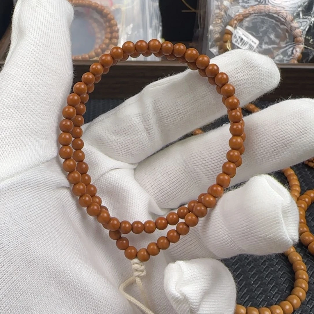 橄榄核吊坠5.0mm老挝核尖圆珠手持