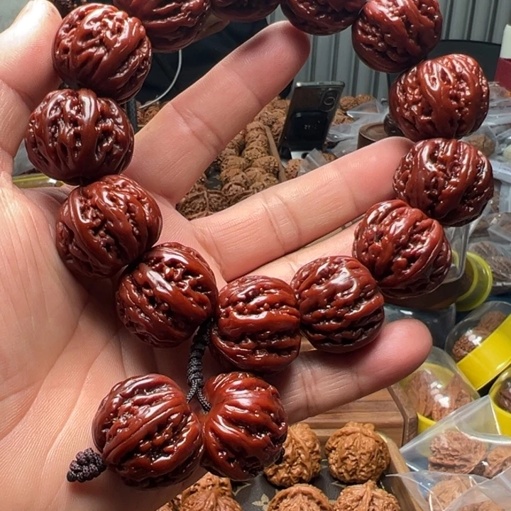 龍***歌文玩核桃把件小核桃手持