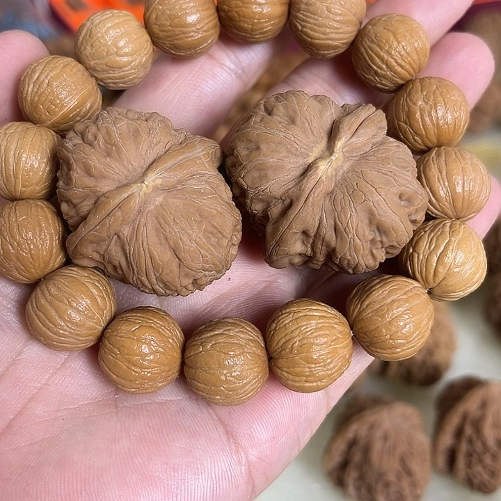 文玩核桃把件猴头凤羽➕赠品瑕疵元宝
