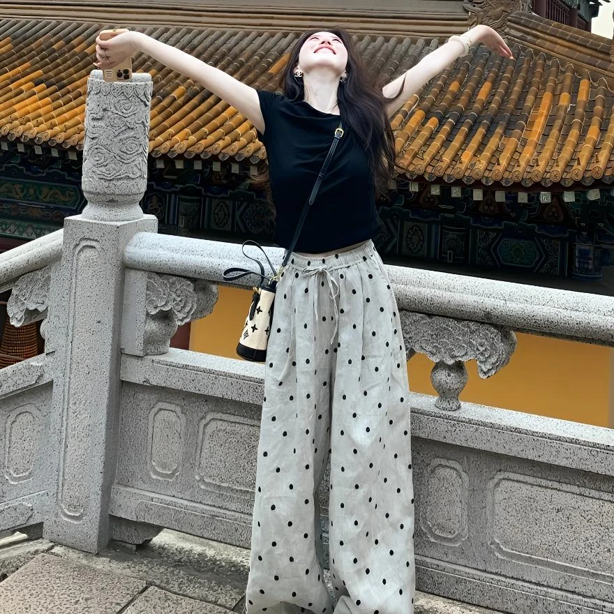 2025夏季新款韩系穿搭松弛感一字肩黑色上衣搭配波点阔腿裤两件套