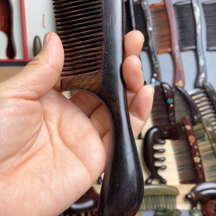 红酸枝木类乌木大水滴款梳子