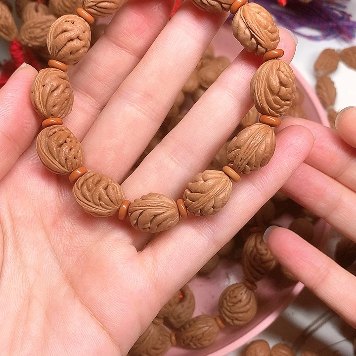向***H野生碧桃核小手串深纹