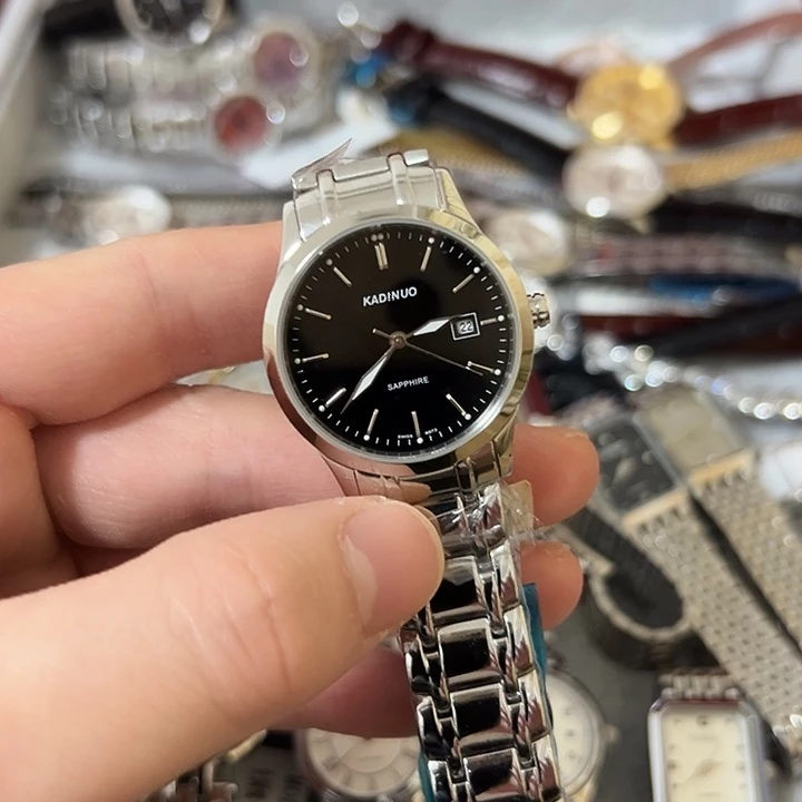 潘***莉钢牛皮（革）钢石英机芯