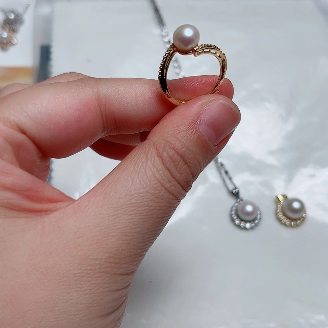 淡水珍珠银S925镶嵌耳饰