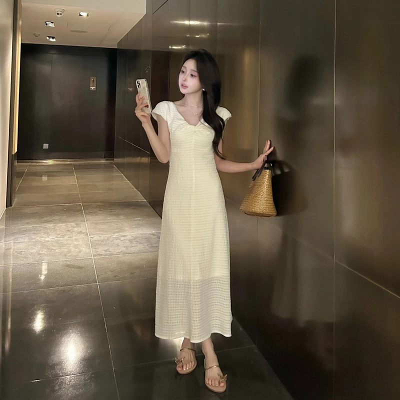 星仔-温柔法式连衣裙女夏季新款复古V领扭结设计收腰纯色气质长裙