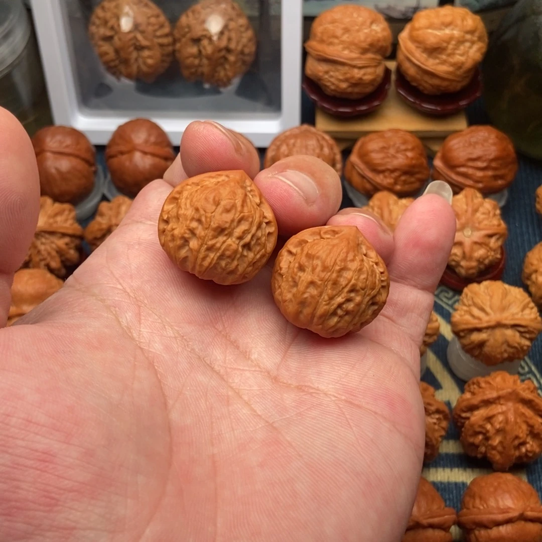 .***.文玩核桃把件桃心