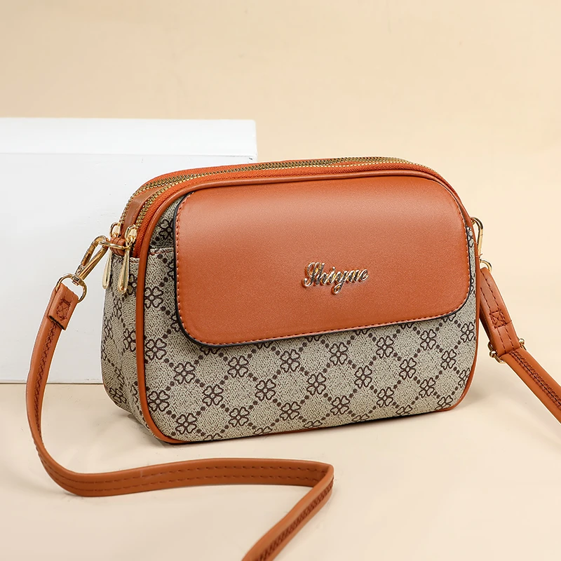 现货现发【长24宽7高15】中年斜挎单肩手机包大容量零钱四叶草