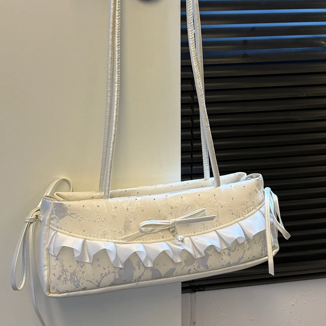 2025夏季新款韩系ins芭蕾风花边蝴蝶结绣花碎钻腋下单肩法棍包