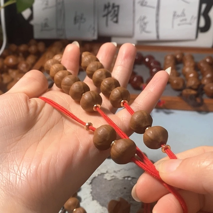 橄榄核手串14*12精品蒜头铁核16+2颗