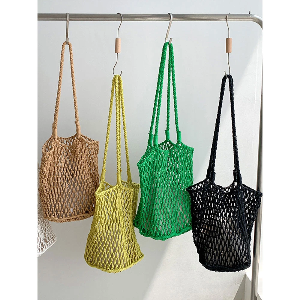 镂空手工编织包包女2025沙滩度假渔网袋慵懒风帆布棉线单肩托特包