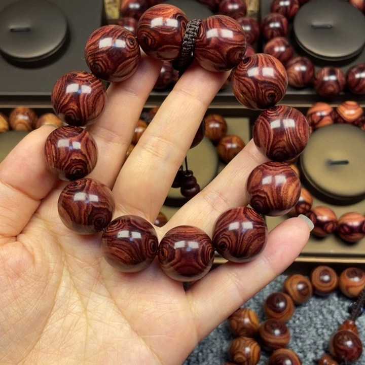 花梨木类明***日2.0对眼……