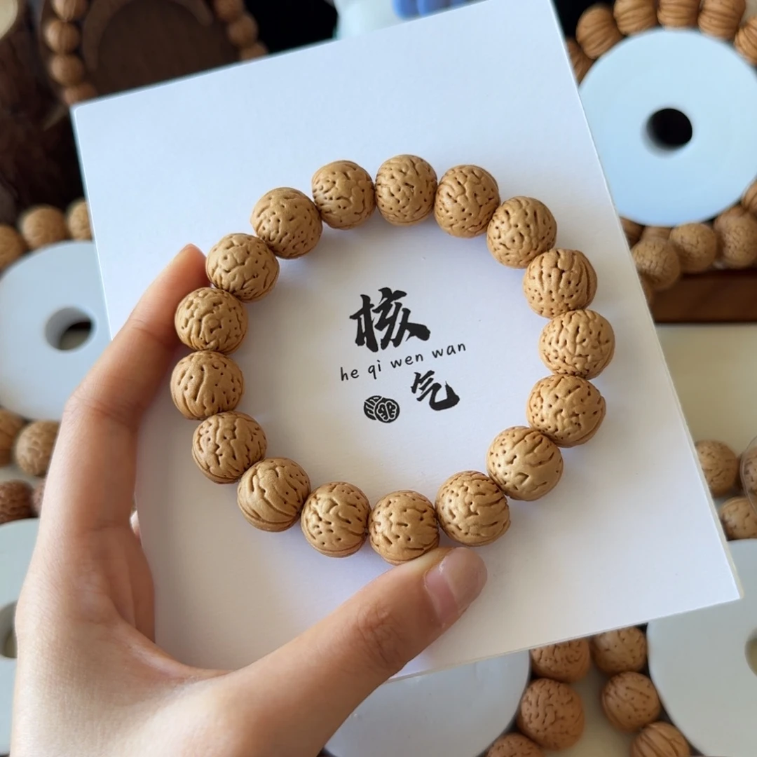 ❀***❀16奶油皮金丹桃核吊坠