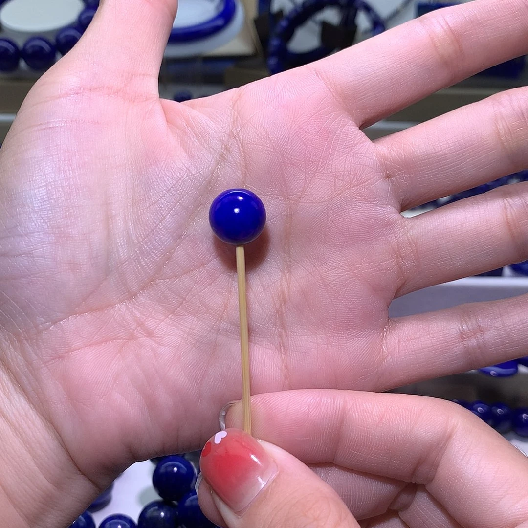 杨***麒青金石未镶嵌单圆珠12 m