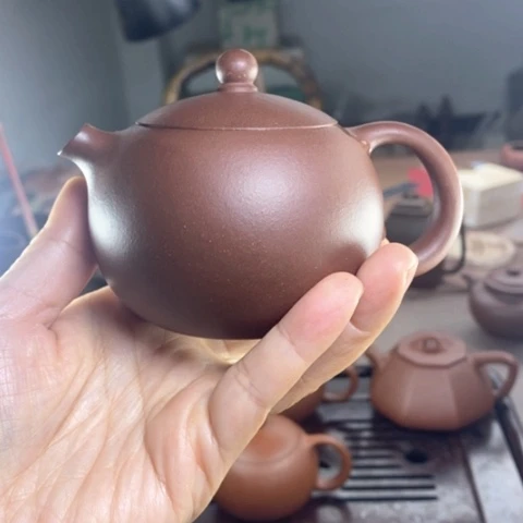 紫砂茶壶明**性原所底槽清掌上明珠200c c微瑕