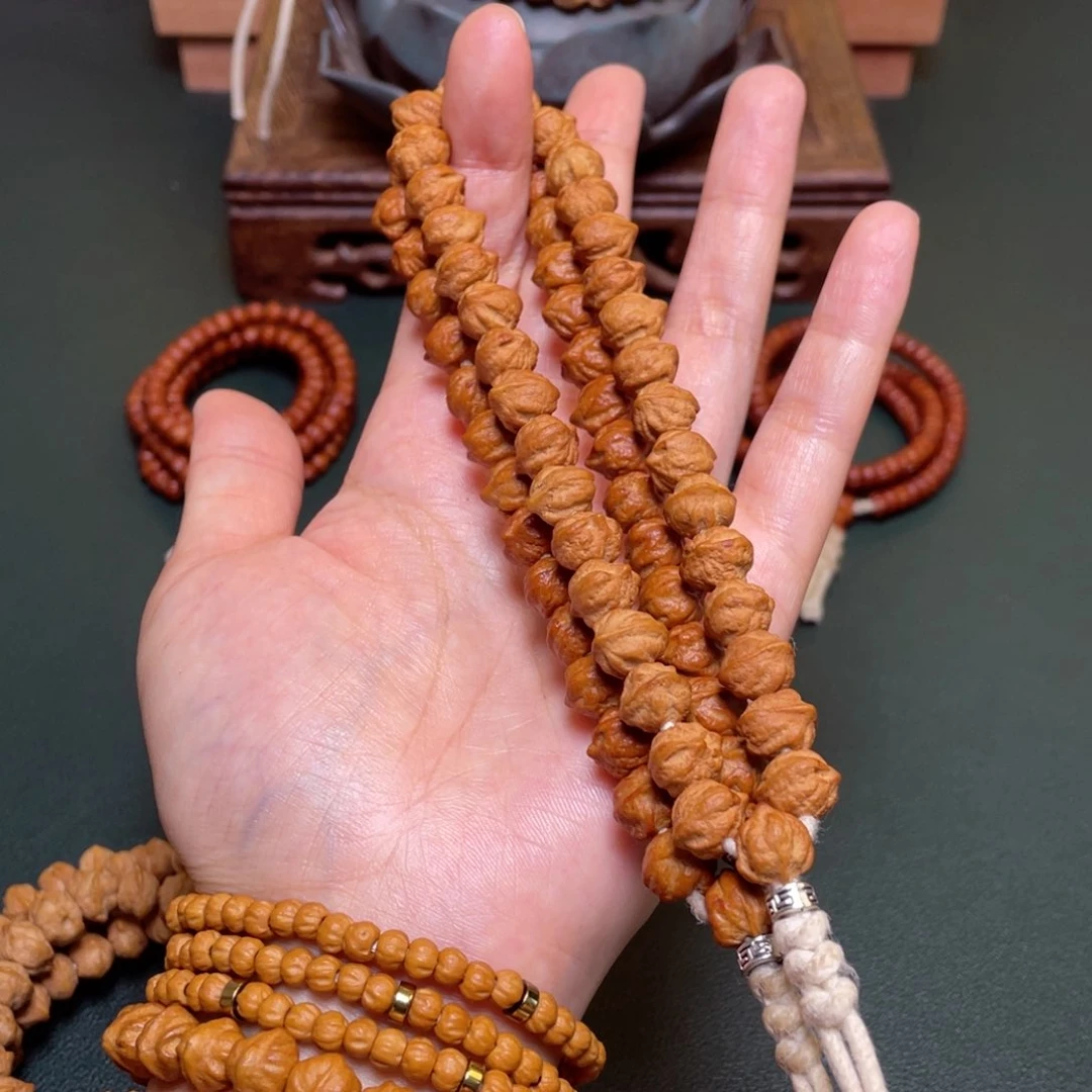 柏香籽/百香籽吊坠白牙横打手持