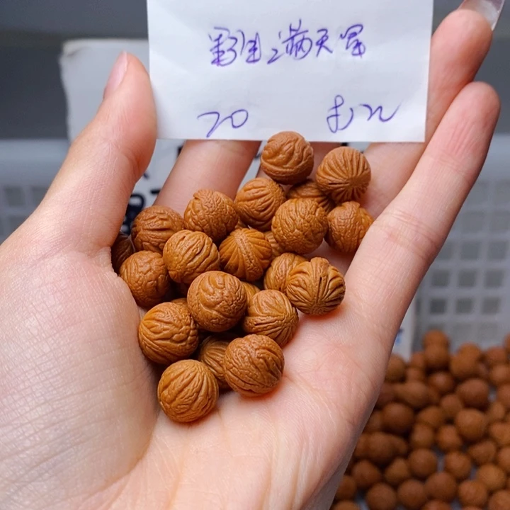尘***儿手串桃核12mm左右野生满天星18+2颗（穿好）