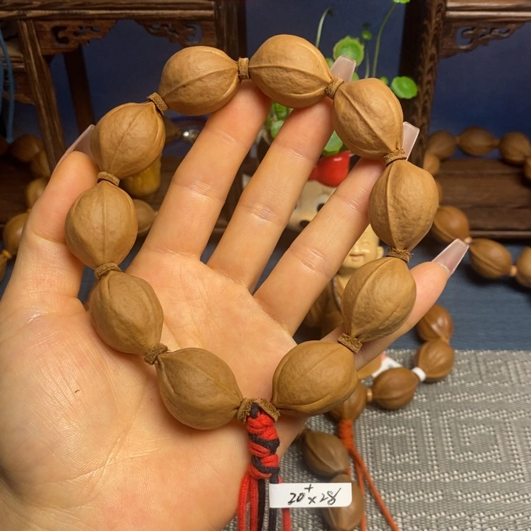 爱***糕橄榄核手串/手链梅林铁20/28左右