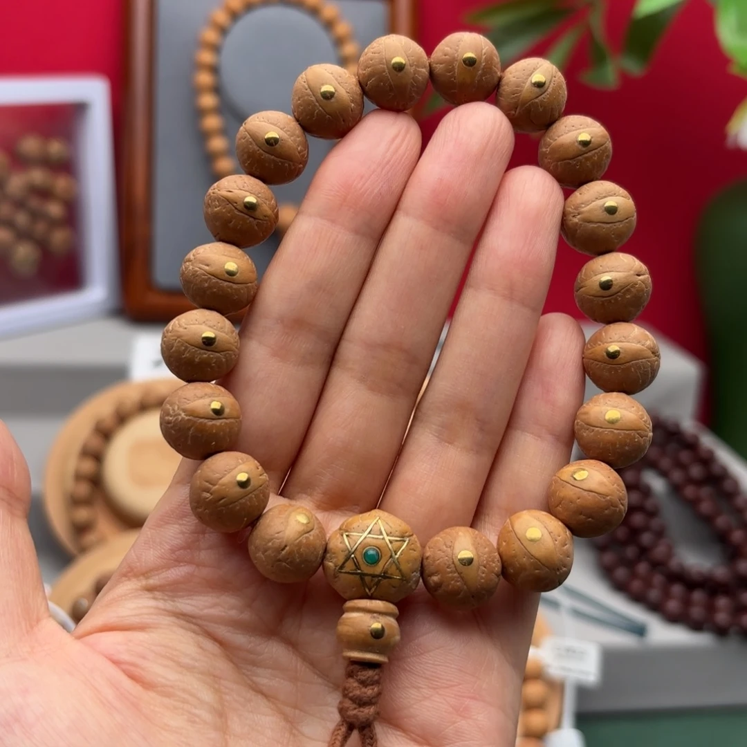 凤眼菩提手串13.5左右铜钉镶嵌手串