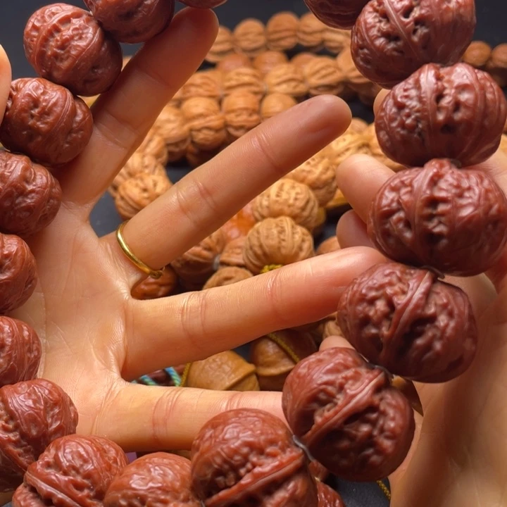 饶***手串文玩核桃红磨盘