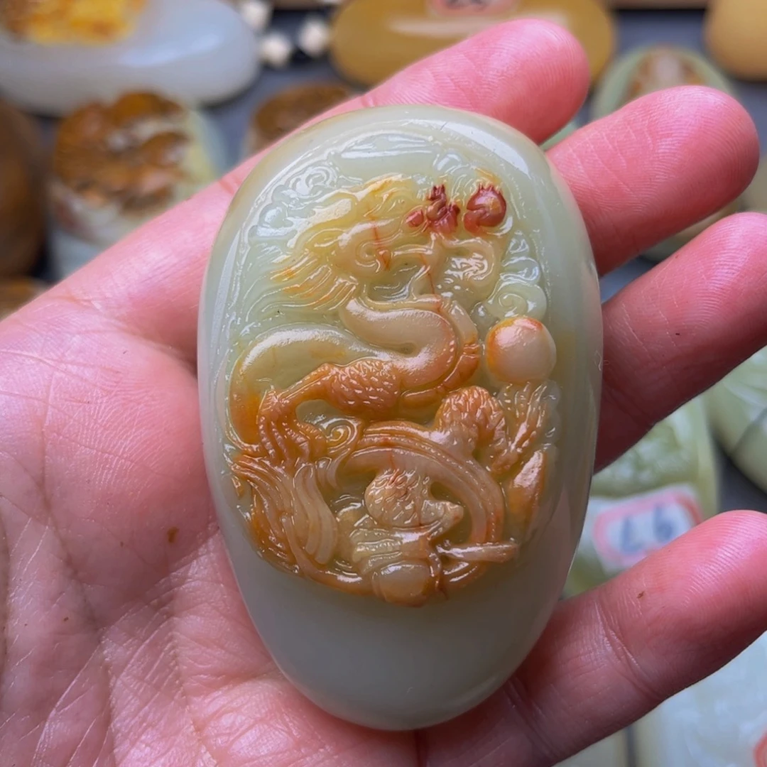 石材方解石手把件龙