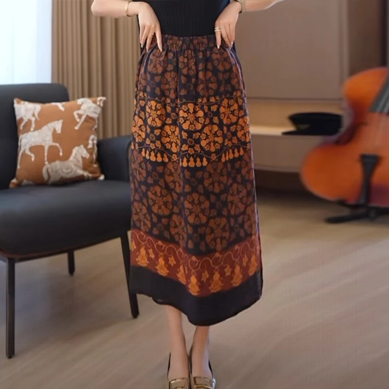 夏季新款气质百搭显瘦松紧腰半身裙女法式轻奢时尚晚霞印花a字裙