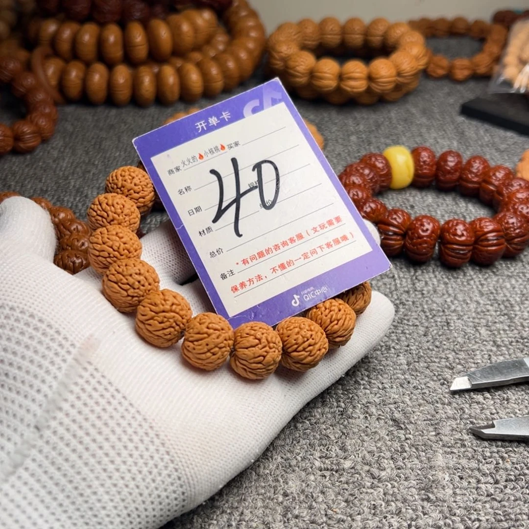 手串桃核龙鳞凤尾40